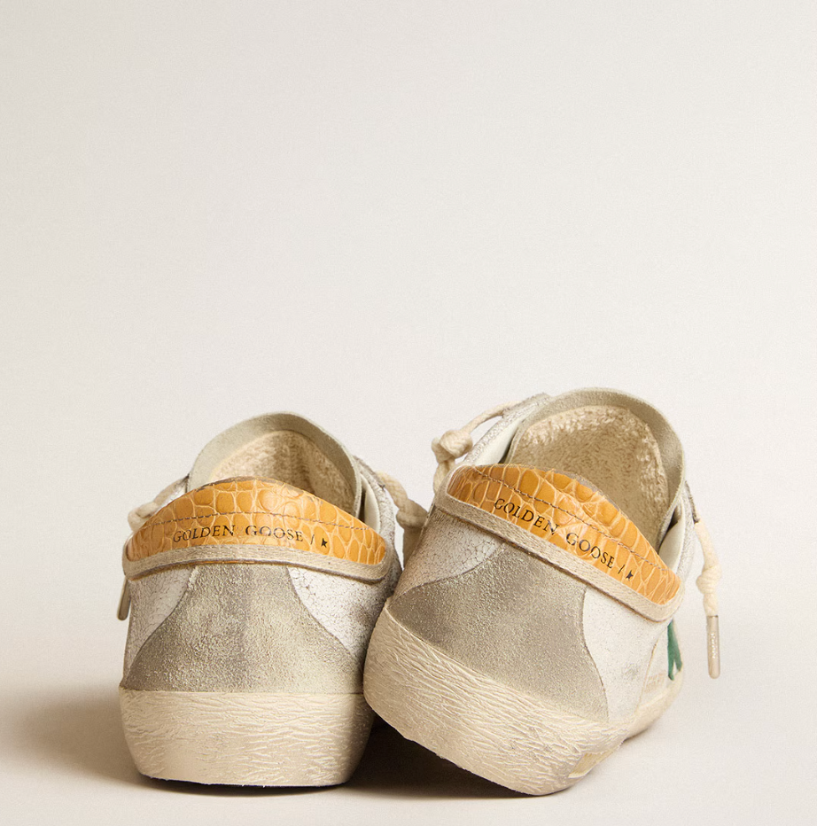 Green suede star and yellow crocodile-effect heel