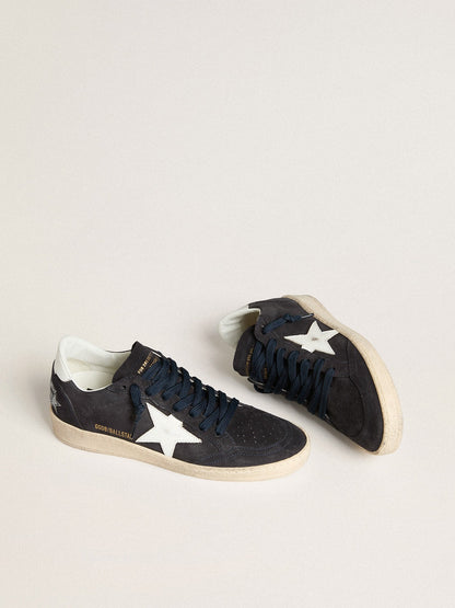 Dark blue suede with a star and a leather heel tab