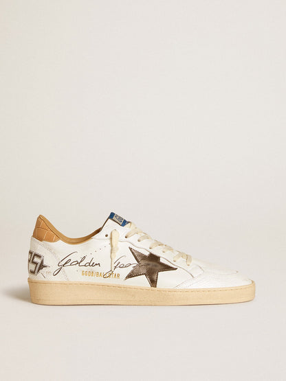 Strap with a laminated star and a crocodile-embossed leather tab