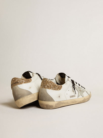 White leather shoes with a glitter heel