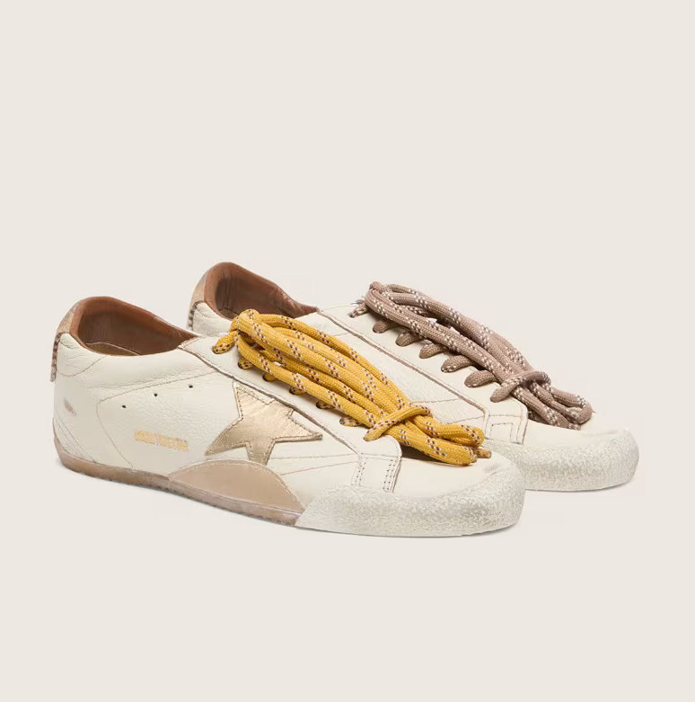 White nappa leather with a gold star and a beige suede heel tab