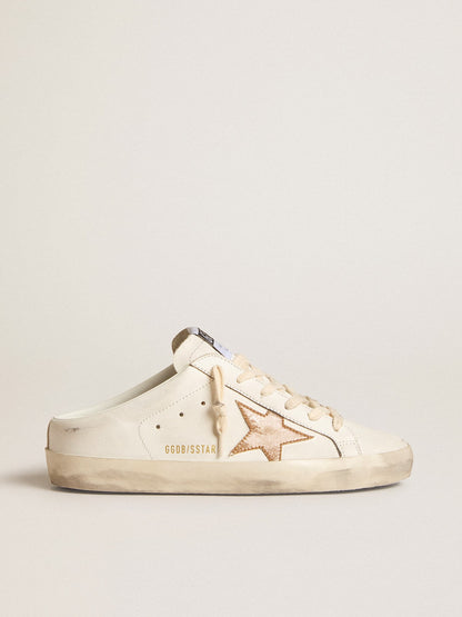 Sabot in leather with a gold-plated glitter star