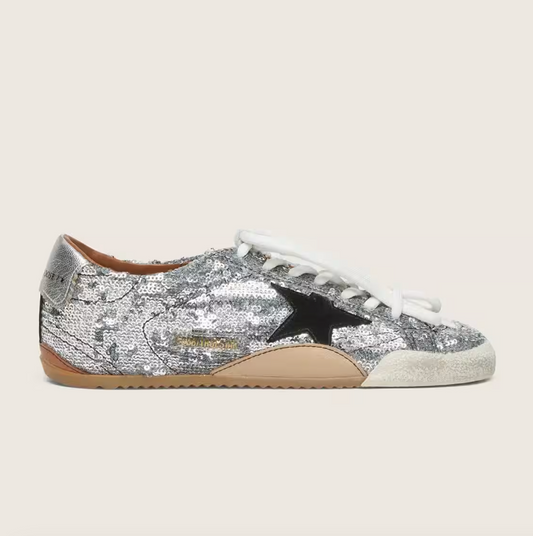 True in silver sequins with a black star and a silver leather heel tab