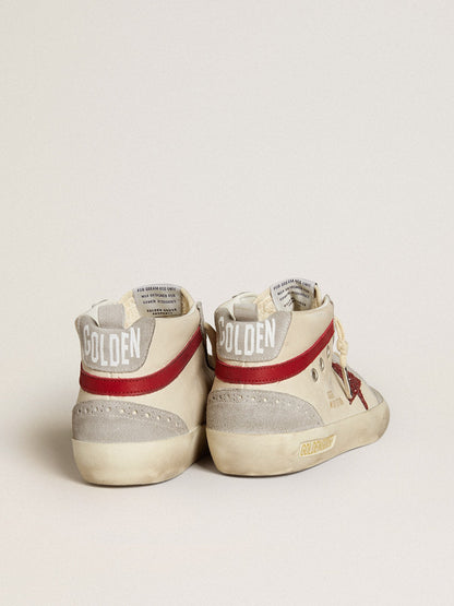 Leather with a glitter star and a red nubuck comma
