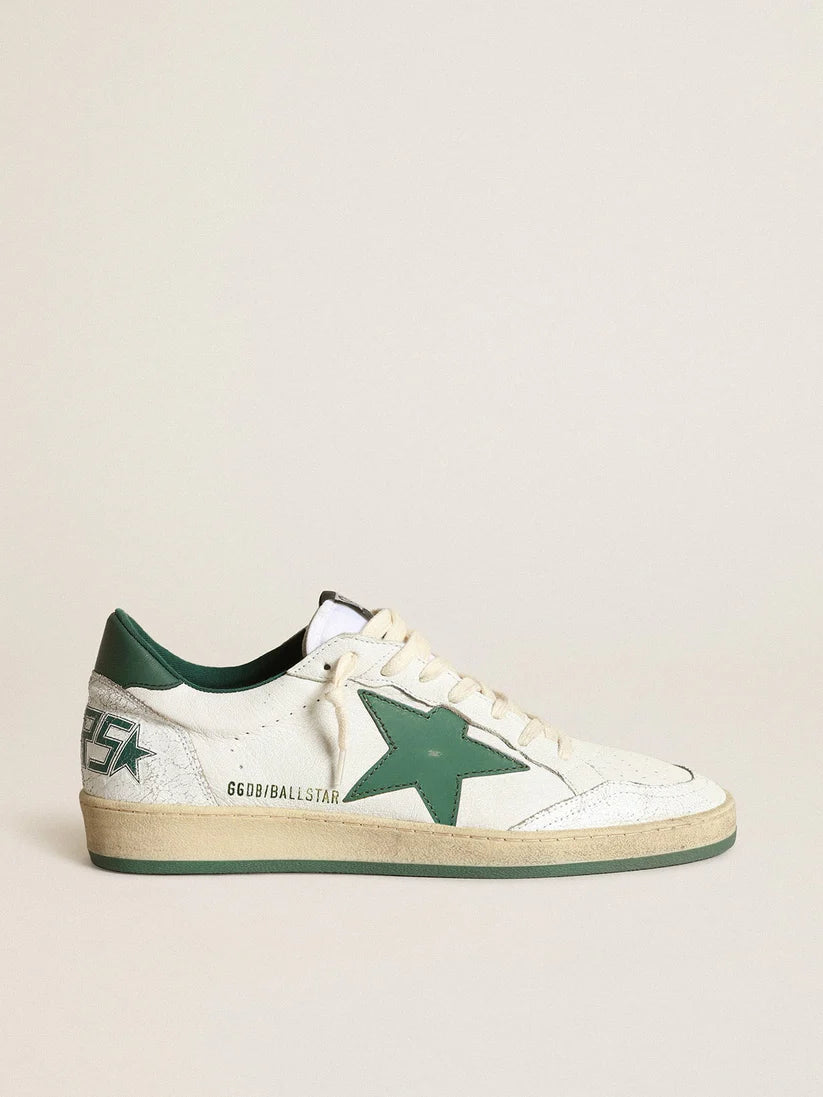 White nappa leather with a star and a green leather heel tab