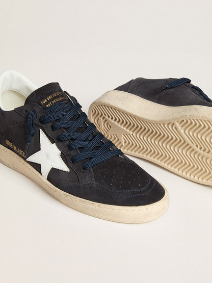 Dark blue suede with a star and a leather heel tab