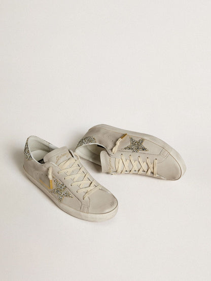 LTD in ivory nappa leather with a star and a platinum glitter heel tab