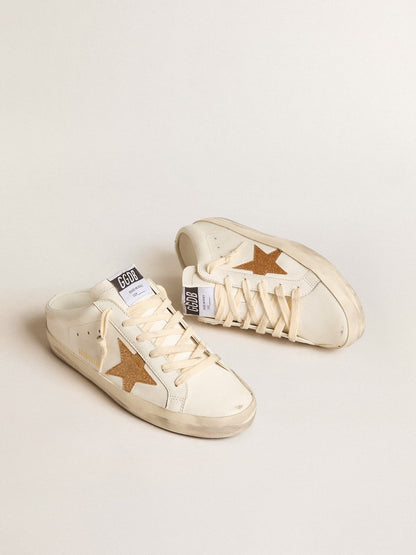 Sabot in leather with a gold-plated glitter star