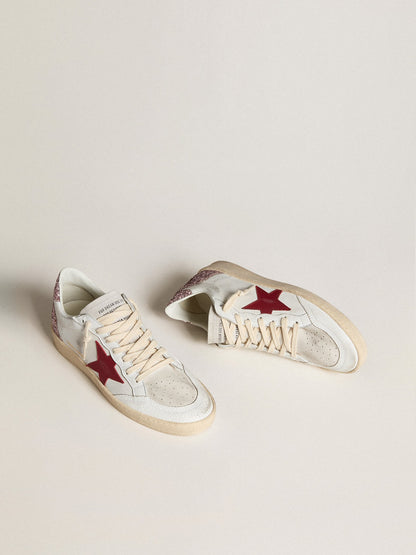 LTD with a red leather star and a pink glitter heel