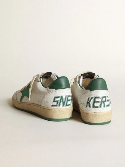 White nappa leather with a star and a green leather heel tab