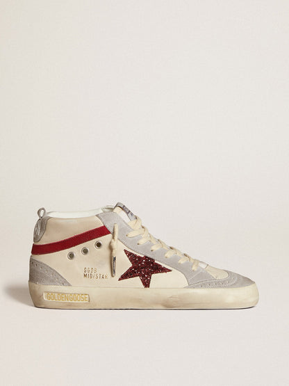 Leather with a glitter star and a red nubuck comma