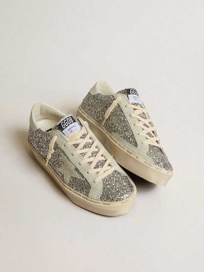 Silver glitter with a suede star and a white heel tab