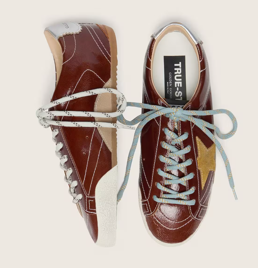 True in burgundy nappa leather with a suede star and a silver nappa leather heel tab