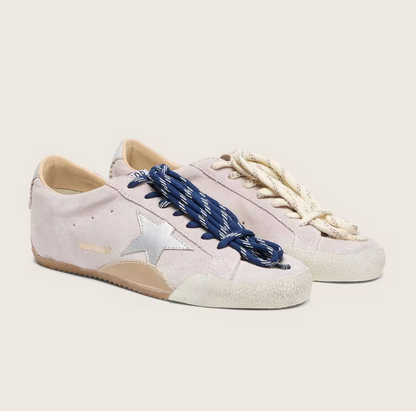 True in pastel pink suede with a star and silver heel tab