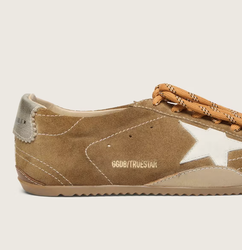 True in tobacco-colored suede with a white star and platinum heel tab