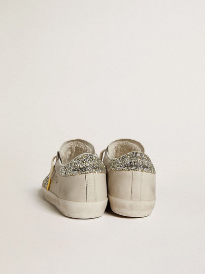 LTD in ivory nappa leather with a star and a platinum glitter heel tab