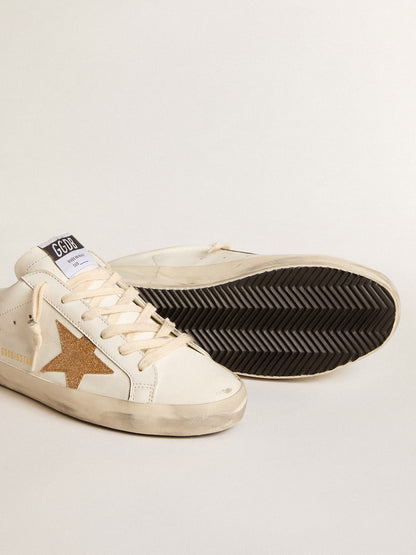 Sabot in leather with a gold-plated glitter star