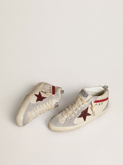 Leather with a glitter star and a red nubuck comma