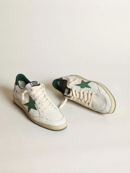 White nappa leather with a star and a green leather heel tab