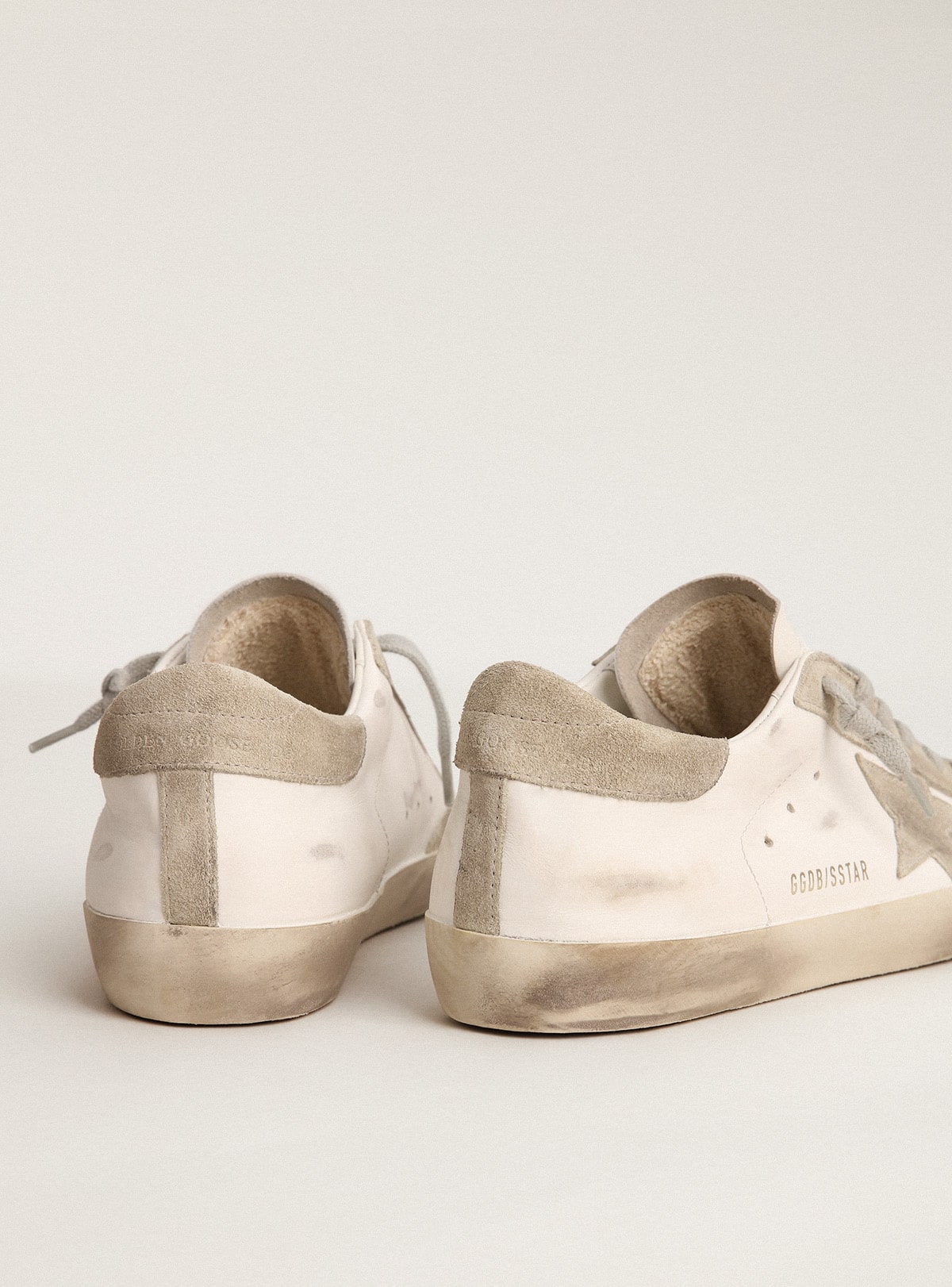 Gray suede star and heel tab