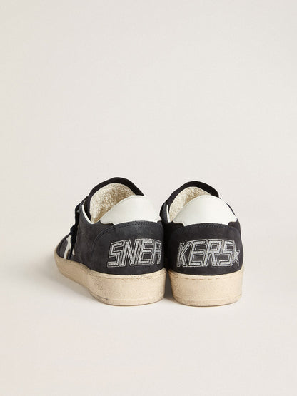 Dark blue suede with a star and a leather heel tab