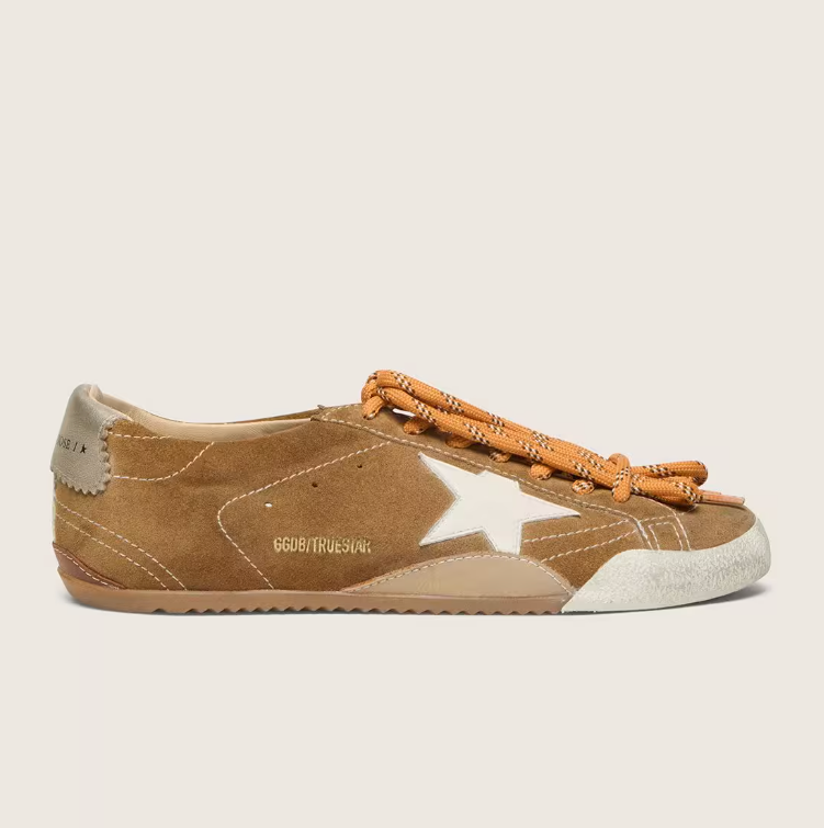 True in tobacco-colored suede with a white star and platinum heel tab