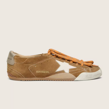 True in tobacco-colored suede with a white star and platinum heel tab