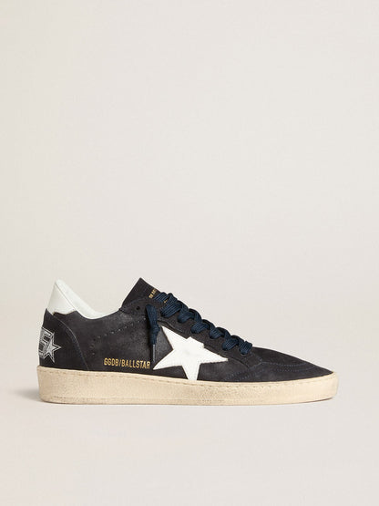 Dark blue suede with a star and a leather heel tab