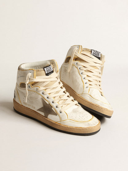 White nappa leather with a tortoise color suede star