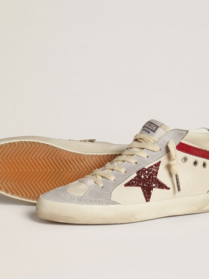 Leather with a glitter star and a red nubuck comma