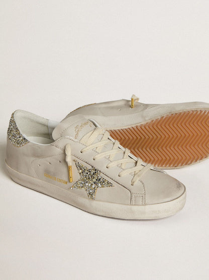 LTD in ivory nappa leather with a star and a platinum glitter heel tab