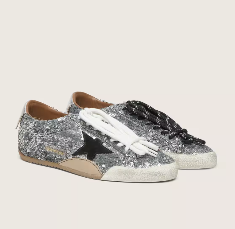 True in silver sequins with a black star and a silver leather heel tab