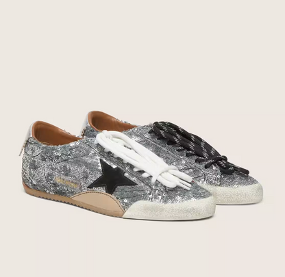 True in silver sequins with a black star and a silver leather heel tab