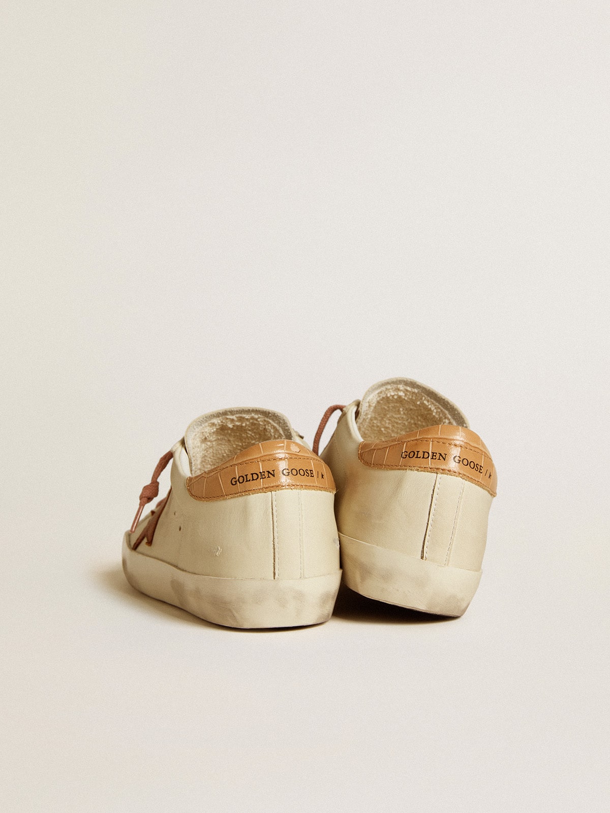 Leather star and crocodile-print leather heel