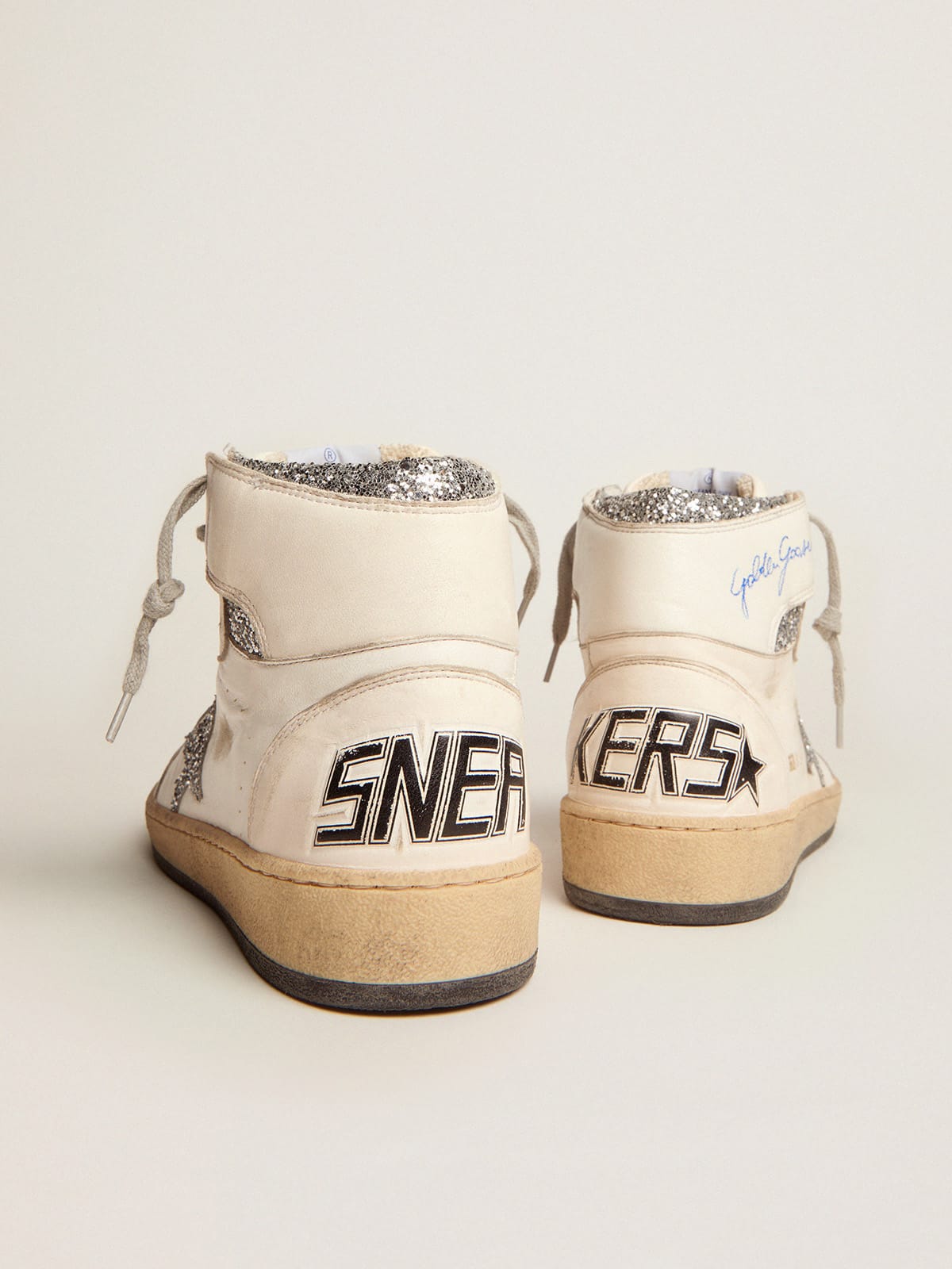Logo on the ankle and silver accents