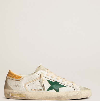 Green suede star and yellow crocodile-effect heel