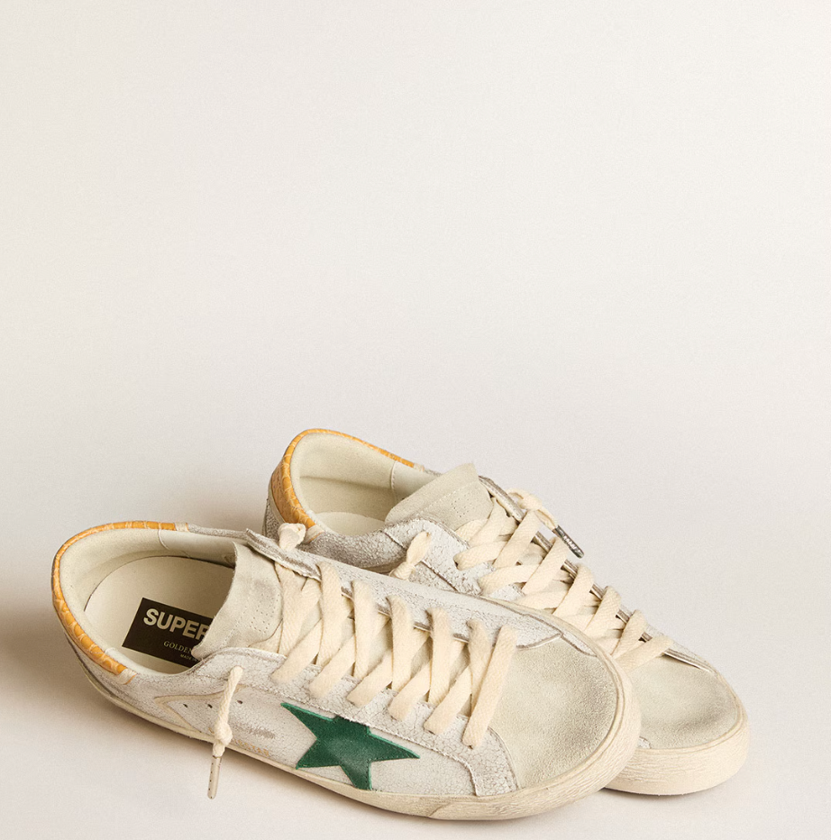 Green suede star and yellow crocodile-effect heel