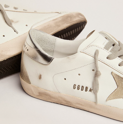 Silver heel and lettering